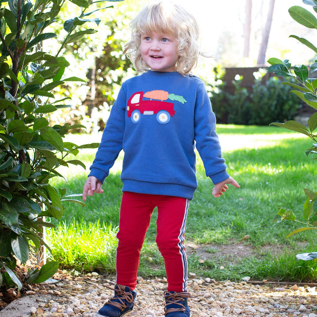 Boy in off to market sweatshirt