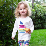 Girl in happy apple shirt