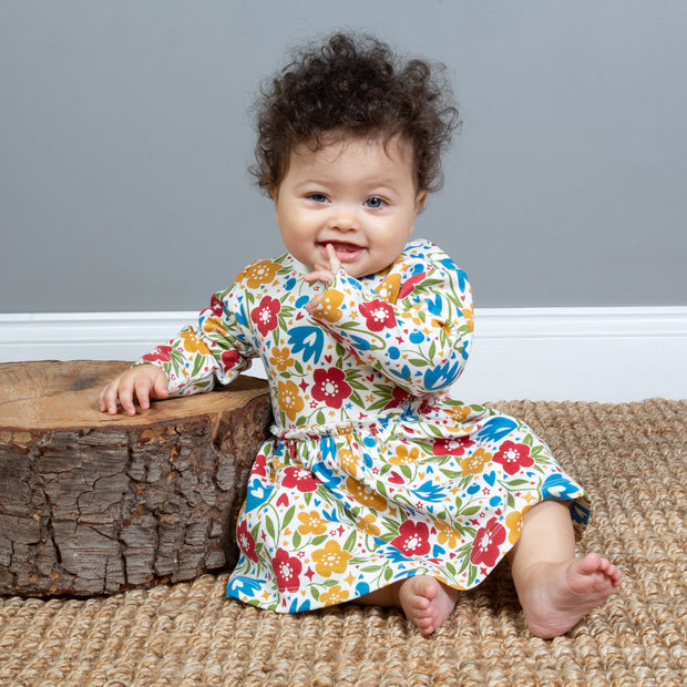 Baby girl in winter floral bodydress