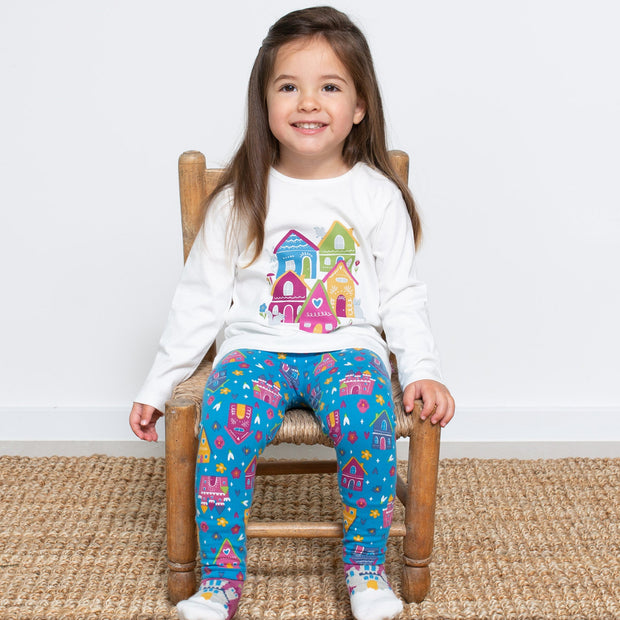 Girl in happy homes shirt